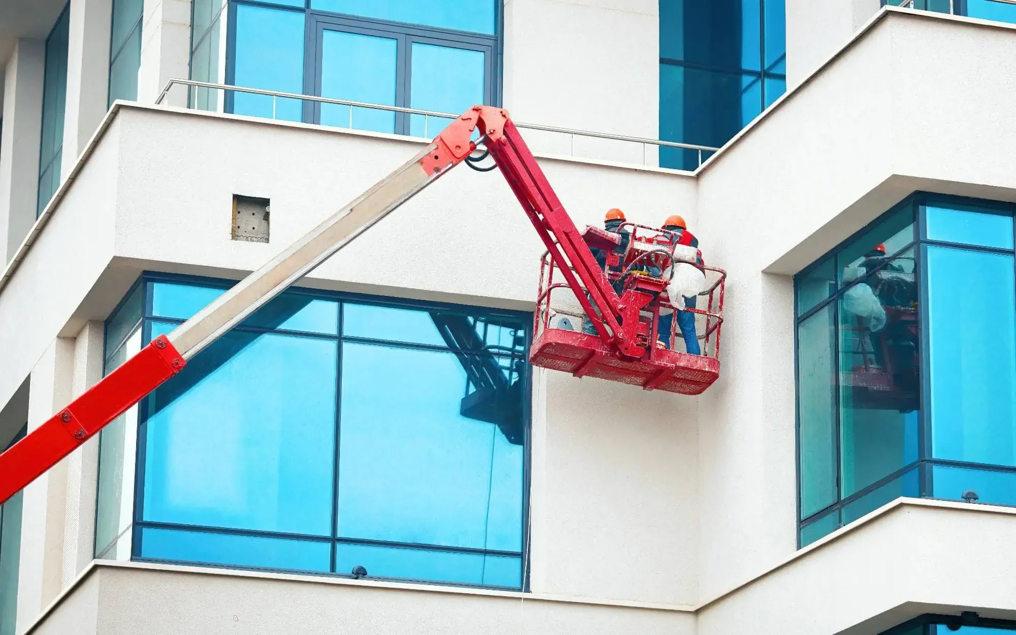 Construction Workers Painting Building Oakland County Michigan