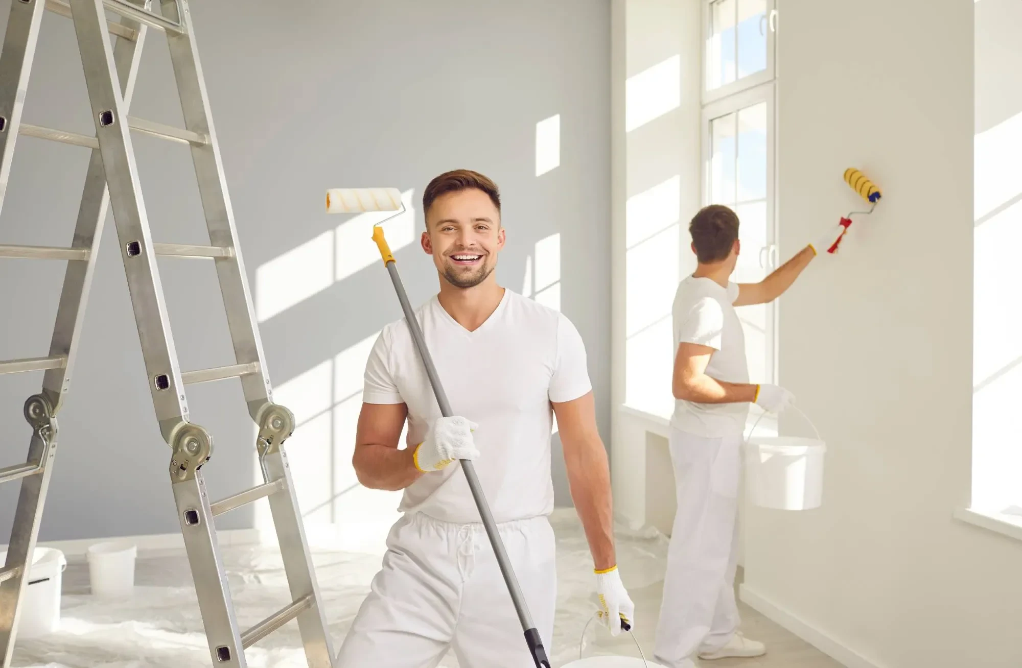 Smiling Painters In Room Oakland County Michigan